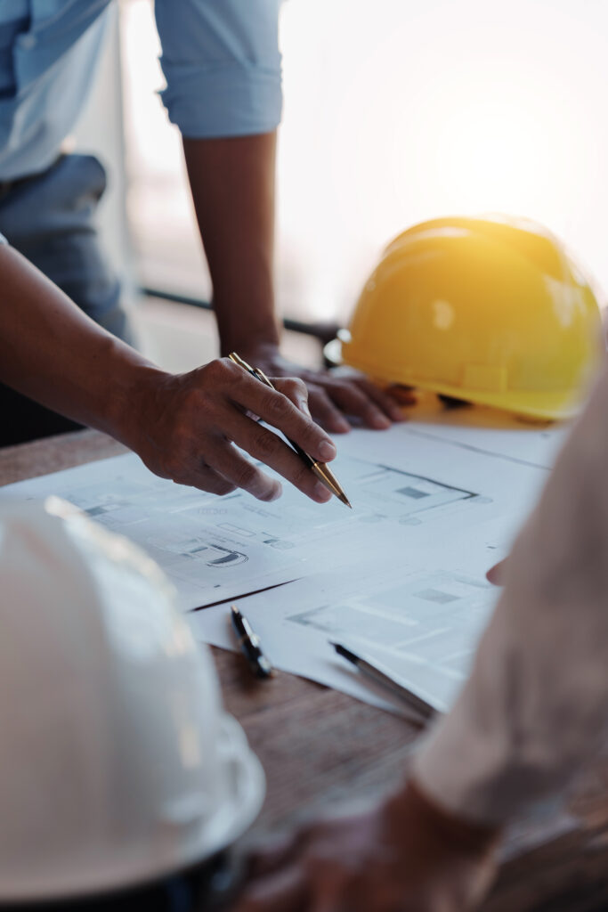 Architects reviewing blueprints in an office