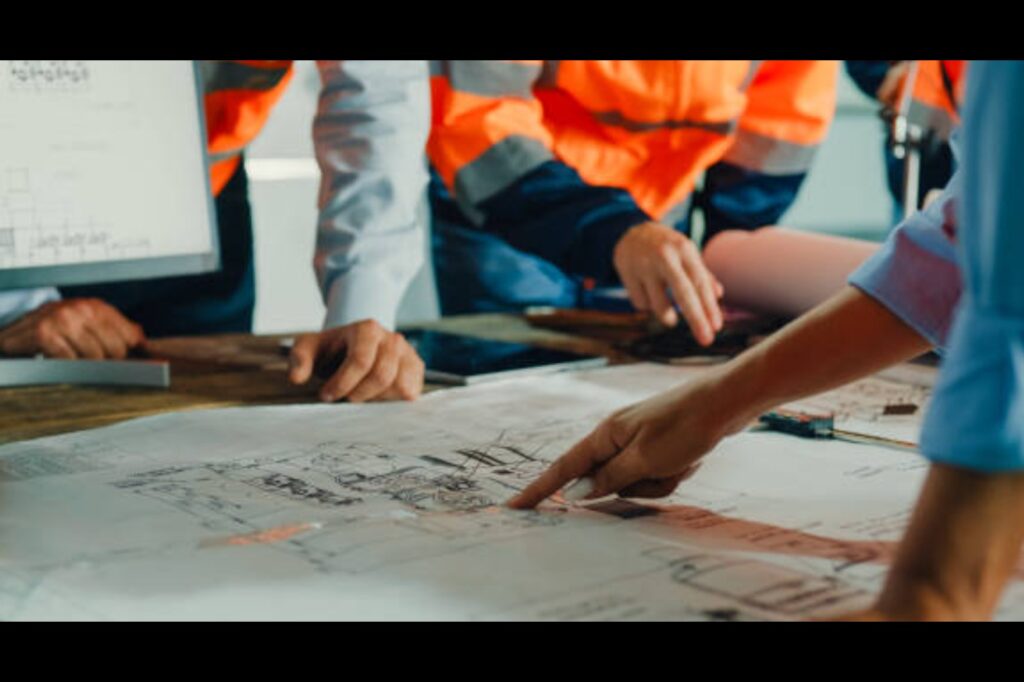 Engineers reviewing fire protection drawings together